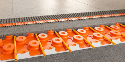 El sistema de suelo radiante de Schlüter-Systems regula la climatización completa de un edificio